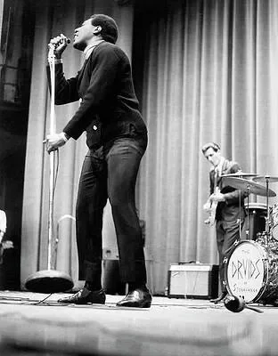 May be a black-and-white image of trumpet, clarinet and saxophone