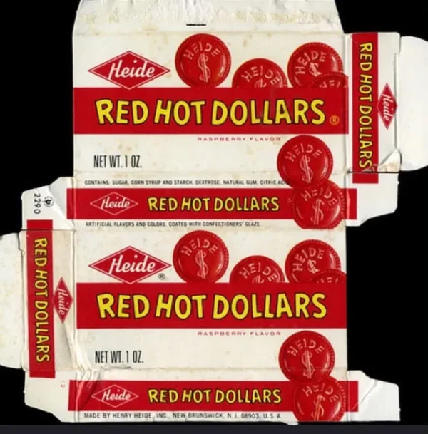 May be an image of text that says 'Heide RED REDHOTDOLLARS HOT DOLLARS RASPBERRYFLAVOR LAVOR REDHOT RED HOT DOLLARS Heide NETWI.1OZ CONTAINS SUGAR CORN SYRUP 67 2290 NỘ STARCH, DENTROSE NATURAL CUM CITRIC o Heide REDHOTDOLLARS REDH DOLLARS ARTIFICIAL FLAVORS AND COLORS COATED ITH CONFECTIONERS GLAZE Heide REDHOT HOT DOD Heide RED RED HOT DOLLARS RASPBERRYFLAVOR RASPBERRY NETWT.1OZ Heide REDHOT REDHOTDOLLARS DOLLARS MADE BY HENRY HEIDE ING. NEW BRUNSWICK N.J 08903, U.S.A.'